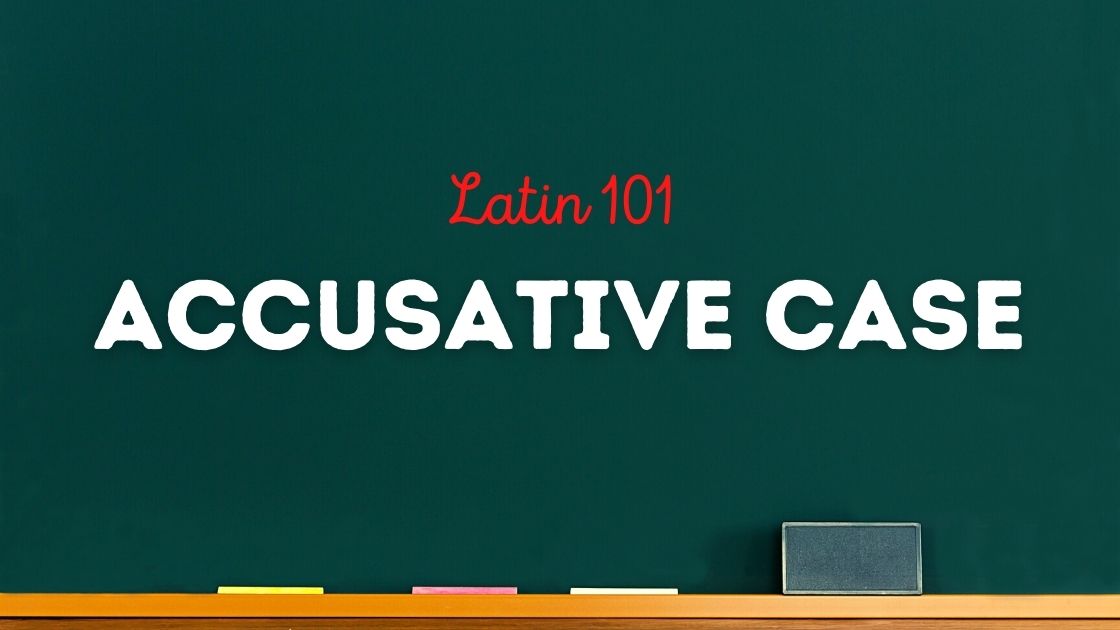 Latin 101 accusative case is written on a green chalkboard